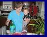 Mom & James prepare drinks